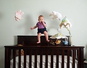 toddler climbing crib